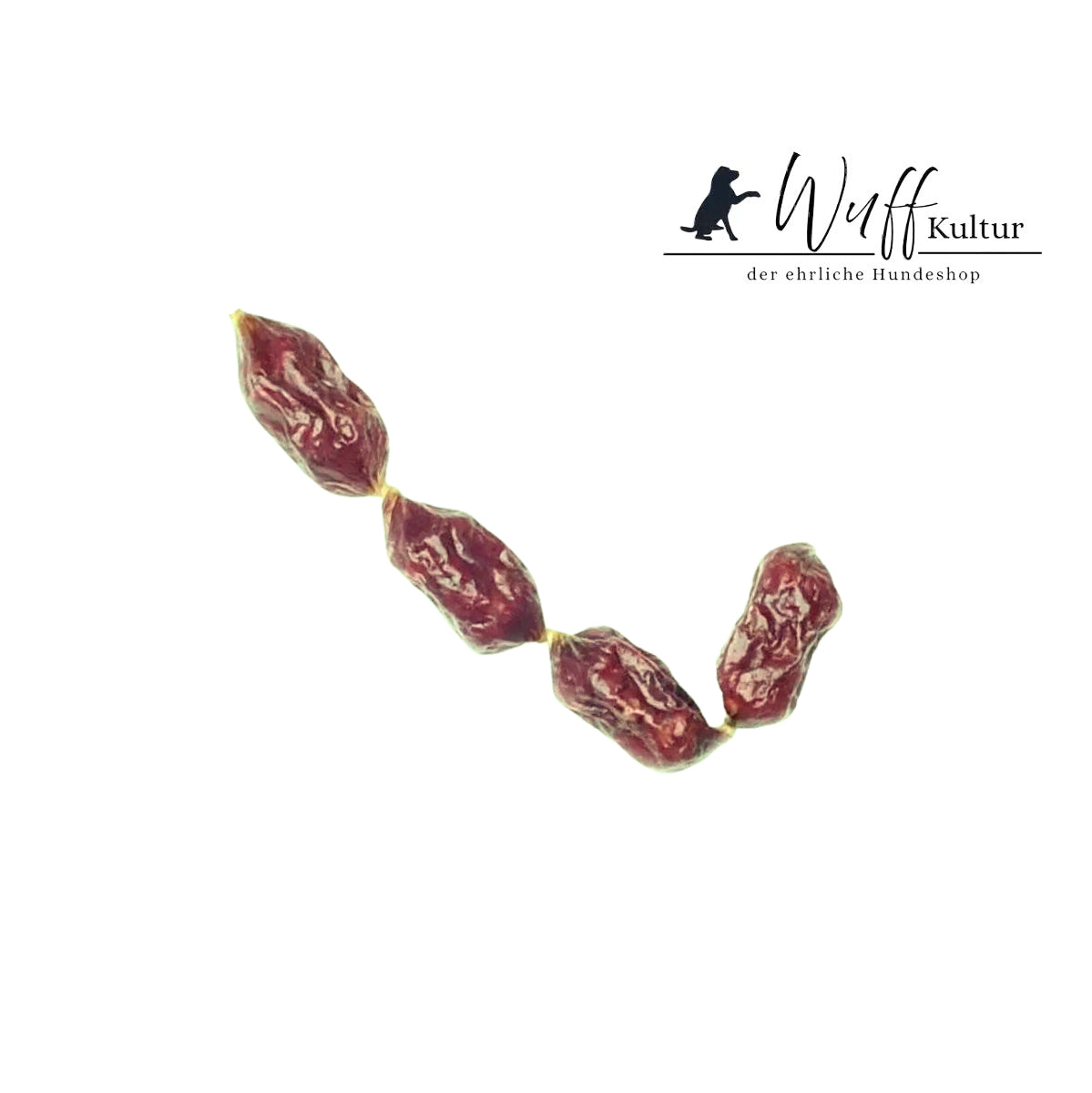 Kaninchenwürstchen mit Löwenzahn für Hunde von Wuffkultur – natürlicher Hundesnack aus Kaninchenfleisch.